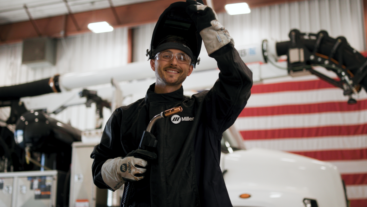 Welder holding btb MIG gun